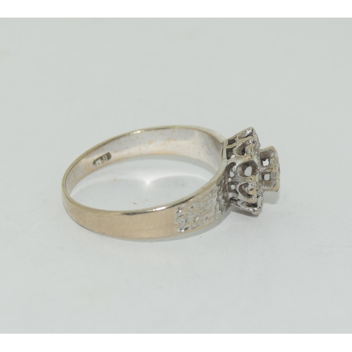 455 - A Vintage 18ct white gold and diamond cluster ring.