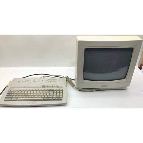 485A - AMSTRAD PC. This is a AMSTRAD 464 plus pc along with a CM14 monitor.