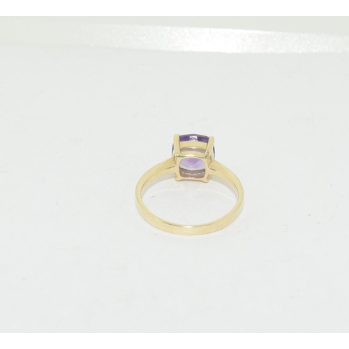 528 - 9ct gold ladies Amethyst solitaire ring size M