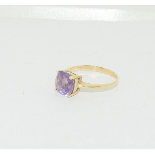 528 - 9ct gold ladies Amethyst solitaire ring size M