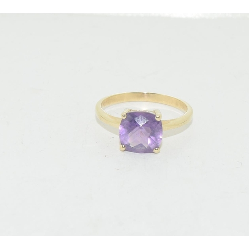 528 - 9ct gold ladies Amethyst solitaire ring size M