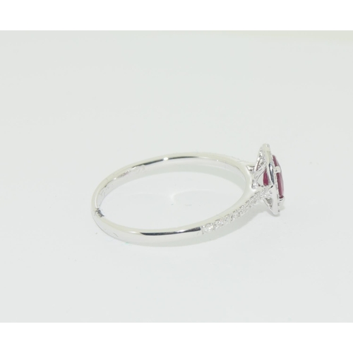 504 - 18ct white gold Ruby and diamond ring approx 85 pionts size O