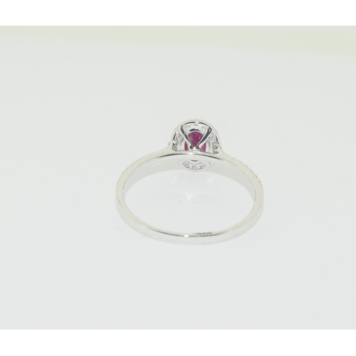 504 - 18ct white gold Ruby and diamond ring approx 85 pionts size O