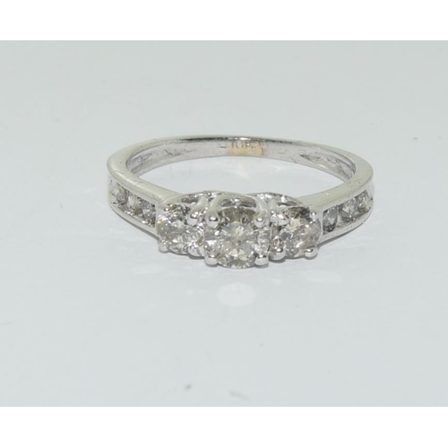 589 - 18ct white gold diamond 3 stone ring the principle stones approx 90 points size N