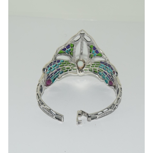 390 - Silver art nouveau style cuff bangle with opal and ruby panel