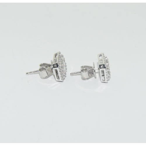 512 - 18ct white gold diamond cluster earrings approx 80 pionts