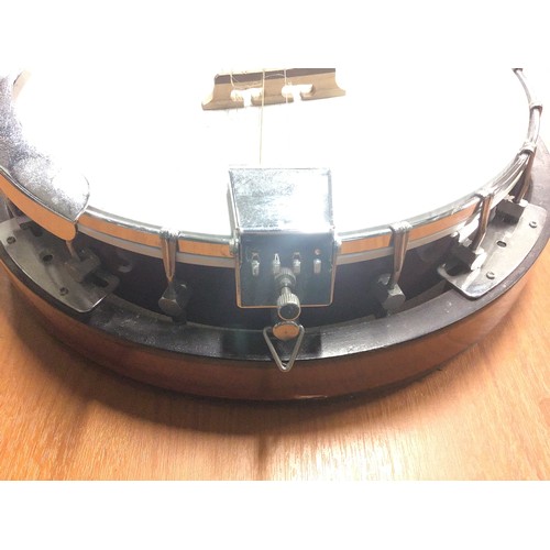 434A - BANJO BY MARTIN SMITH. Here we have a Remo 6 string Weatherking banjo in need of new strings. Plus s... 