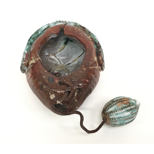 31 - Poole Pottery interest Guy Sydenham hanging mask with cord (possibly a door knocker) overall length ... 