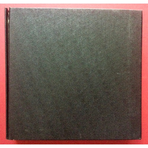 279 - BLACK RECORD FOLDER. A great folder in Ex condition here housing 20 various Beatle singles on the Pa... 