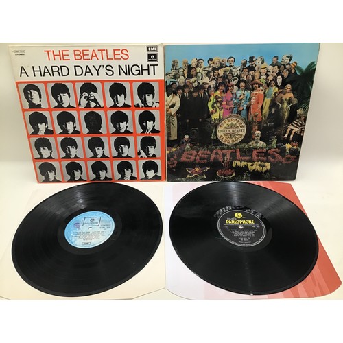 223 - 2 VINYL BEATLES LP RECORDS. Here we have an Italian copy of ‘A Hard Day’s Night’ followed by a UK co... 