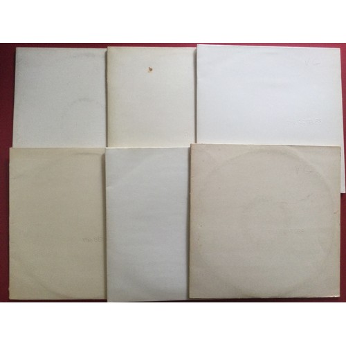 80 - THE BEATLES ‘WHITE ALBUM’ x 6 COPIES. This set of LP’s are all in VG condition with raised Band name... 