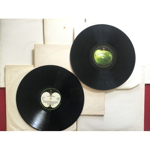 80 - THE BEATLES ‘WHITE ALBUM’ x 6 COPIES. This set of LP’s are all in VG condition with raised Band name... 