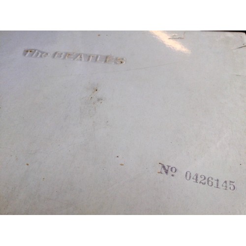 224 - BEATLES VINYL LP RECORD ‘ THE WHITE ALBUM’. This numbered (0426145) double album is a top opener com... 