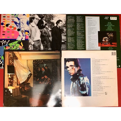 334 - 5 X ELVIS COSTELLO VINYL LP RECORDS. Titles as follows - This Years Model - Armed Forces - Punch The... 