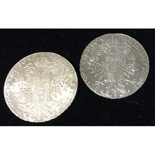 87 - Pair of 1780 restrike Maria Theresia Thalers .835 silver coins. Lot also includes USA One Dollar Sta... 