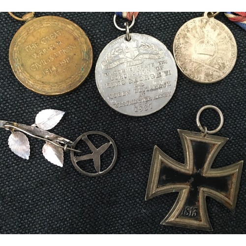 81 - Collection of Military and other to include a German Iron cross