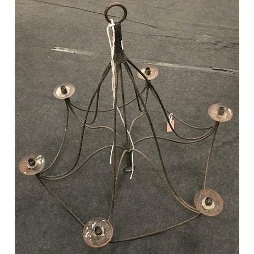 9 - Large rustic cast metal six branch candelabra. Approx 36