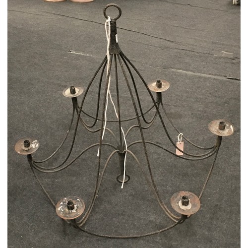 9 - Large rustic cast metal six branch candelabra. Approx 36