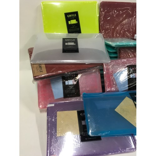 299 - Large box of as new sealed GMYLE plastic laptop covers (approx 30).