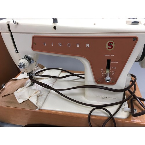 297 - Singer electric sewing machine model 239 with original box and instructions