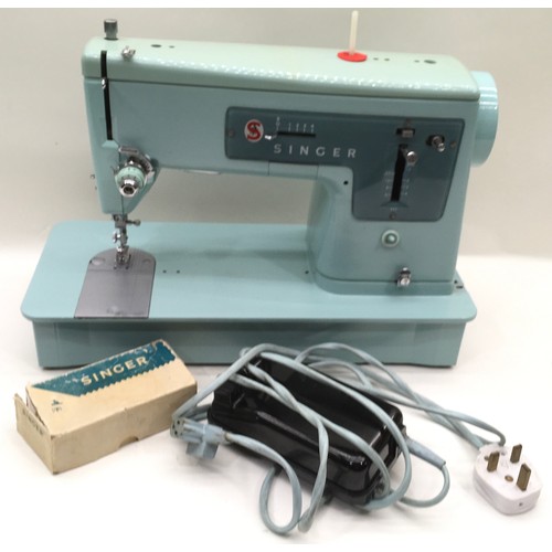 295 - Vintage blue Singer sewing machine in original case.