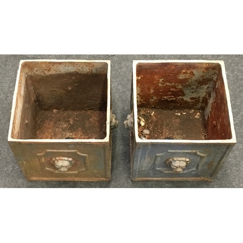 287 - A pair of antique cast metal planters with lion head finials each measuring 28x28x30cm.