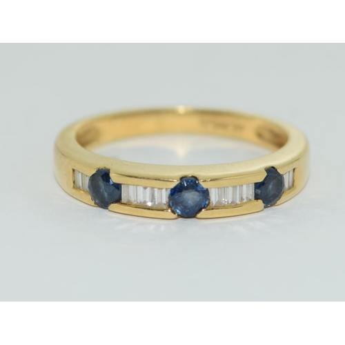 414 - Sapphire and baguette diamonds 18ct gold ring Size N