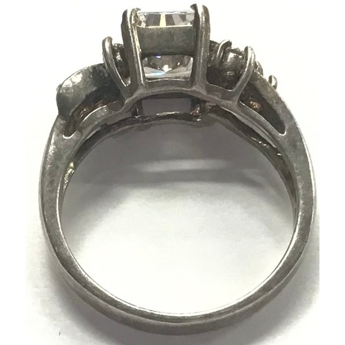 379 - Silver ring with clear stones size O.