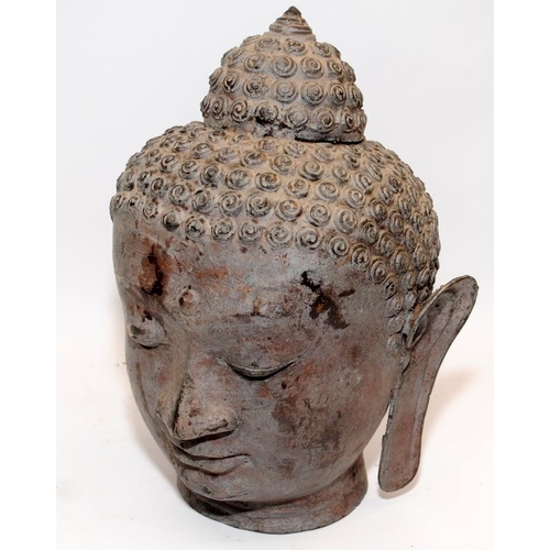 48 - Cast metal Buddha head approx 28cms tall