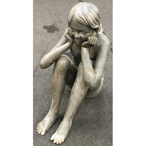 23 - Large bronze decorative sculpture of a girl sitting 67x33x55cm.