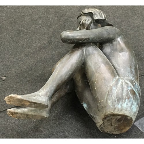 23 - Large bronze decorative sculpture of a girl sitting 67x33x55cm.