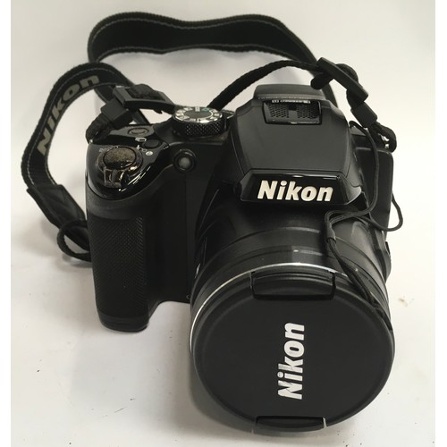 45 - A Black Nikon CoolPix P500 digital camera. (127)