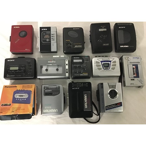 173 - BOX OF VARIOUS PORTABLE WALKMANS. In total we have 14 units here that are made by various manufactur... 