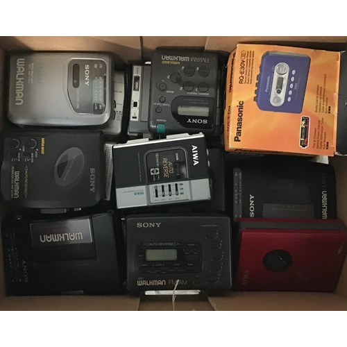 173 - BOX OF VARIOUS PORTABLE WALKMANS. In total we have 14 units here that are made by various manufactur... 