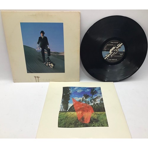 39 - PINK FLOYD ALBUM ‘WISH YOU WERE HERE’. A VG+ condition of this iconic LP from 1975 on Columbia BL 33... 