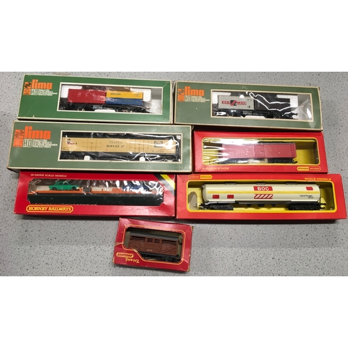 79 - Various boxed OO gauge rolling stock to include Hornby R126 Car Transporter, R667 B.O.C 100 Ton Tank... 