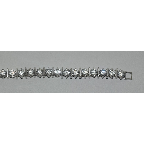 322 - Quality CZ studded 925 silver line bracelet.