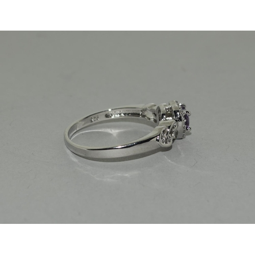 410 - Amethyst CZ w/g on 925 silver love heart ring Size T 1/2.