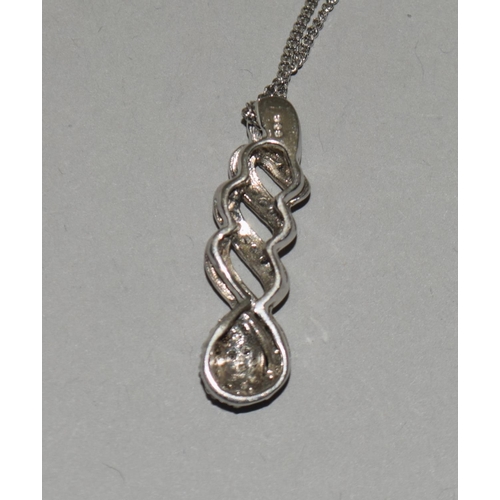 419 - Diamond W/G on 925 silver pendant and chain.