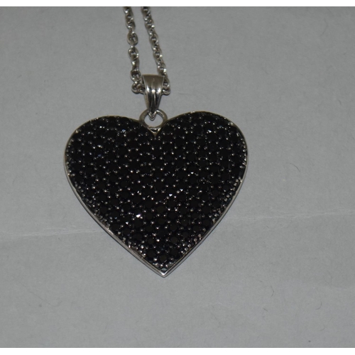 359 - Large black gemset w/g on 925 silver heart pendant.