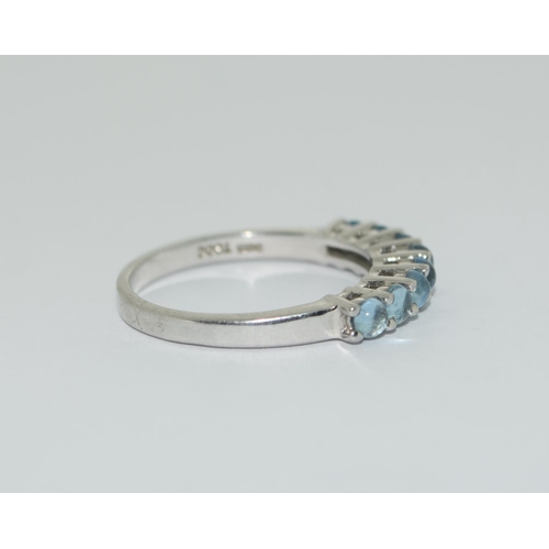 386 - A 925 silver and blue topaz ring, Size R