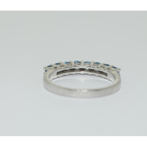 386 - A 925 silver and blue topaz ring, Size R