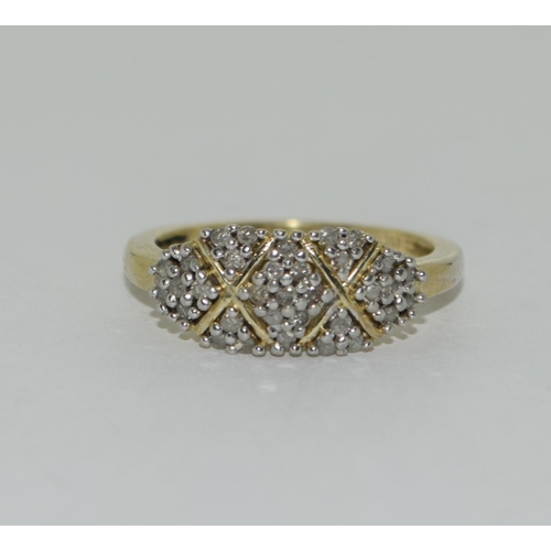 337 - 925 silver Diamond cluster ring. Size Q.