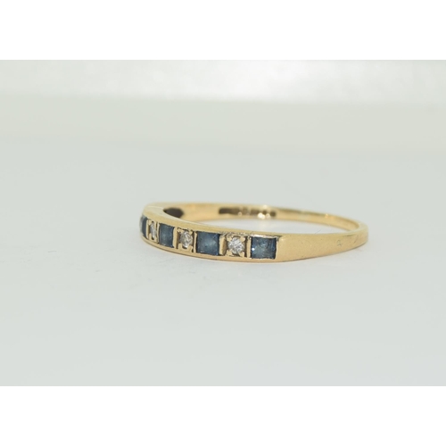 366 - 9ct gold ladies sapphire and diamond half eternity ring size S