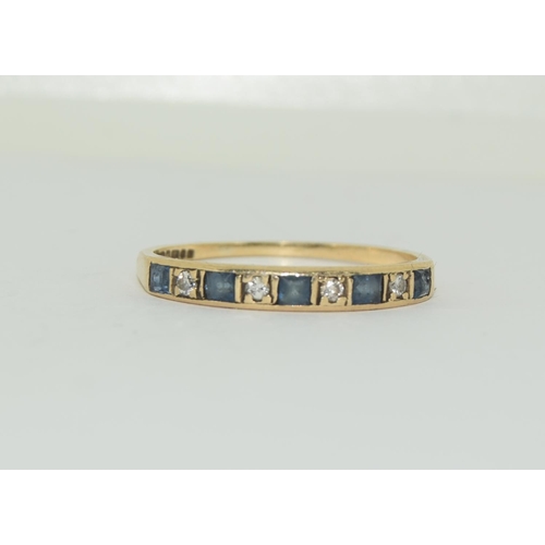 366 - 9ct gold ladies sapphire and diamond half eternity ring size S