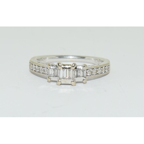 316 - 18ct white gold ladies square set diamond ring H/M 0.25ct size L