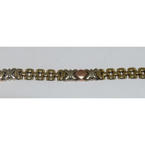 402 - 9ct gold ladies fancy link bracelet, 9.8g