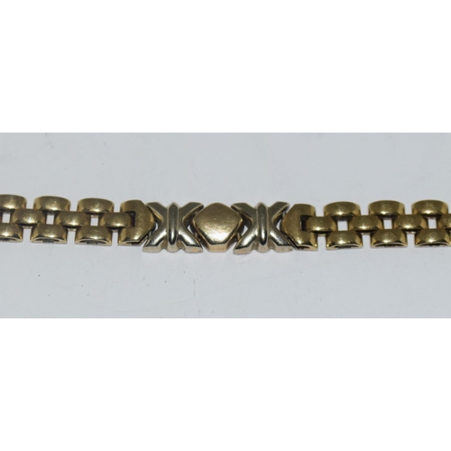 402 - 9ct gold ladies fancy link bracelet, 9.8g