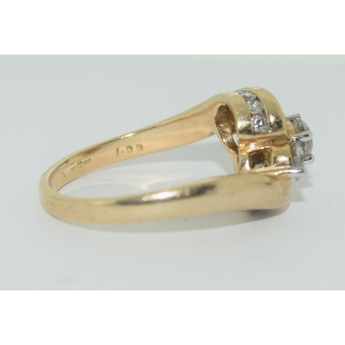 391 - 9ct gold ladies diamond 3 stone twist ring with diamonds set to shoulders hall marked in ring as 1 c... 