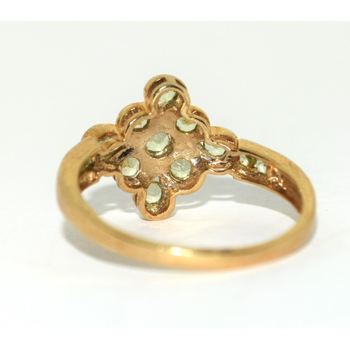 371 - 9ct gold ladies designer Peridot star ring size X